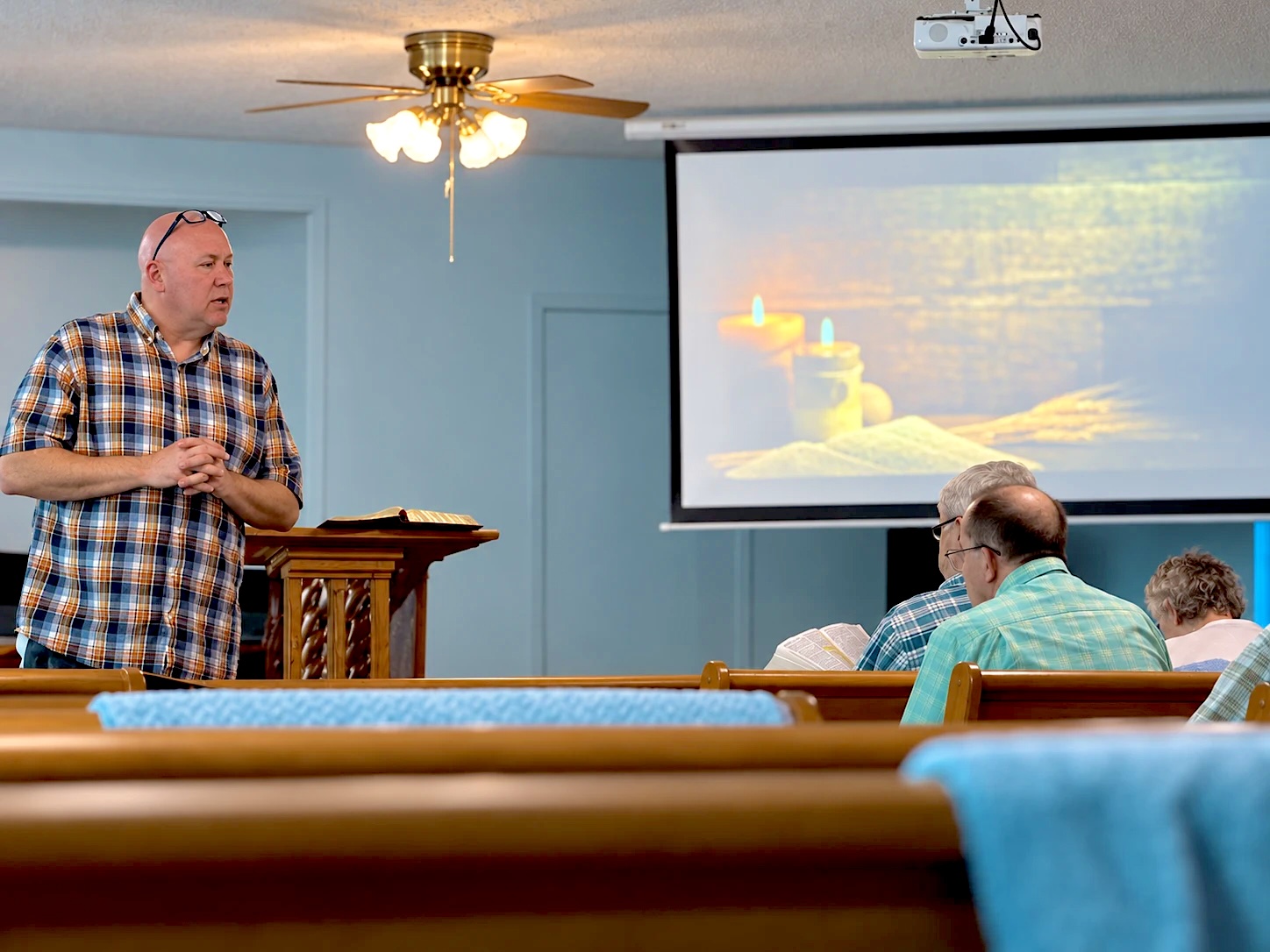 Pastor Vince teaching from the pulpit during a Sunday service